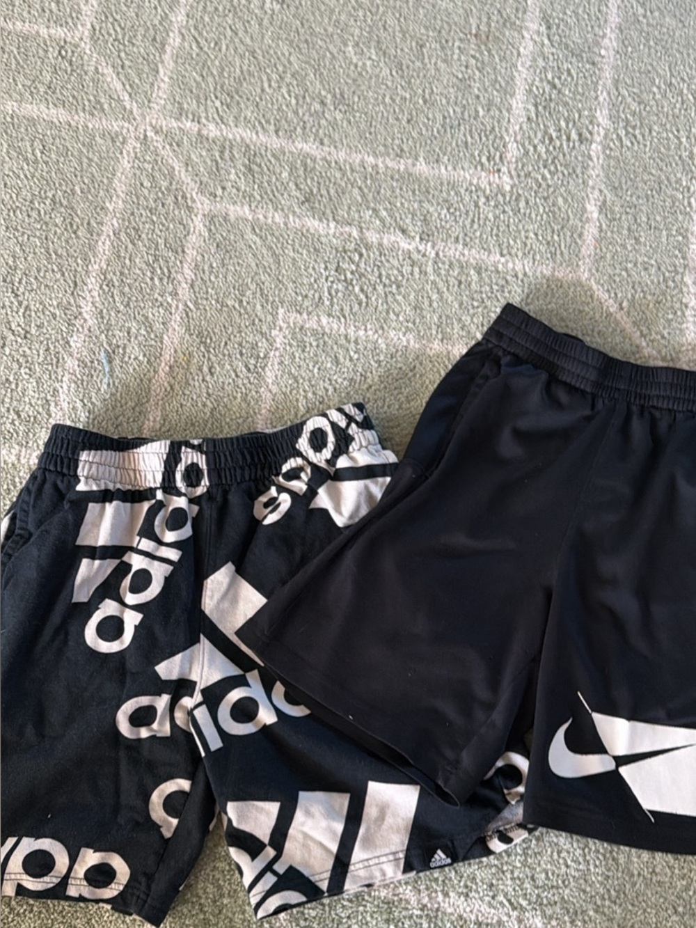 Two pairs of boys size large name brand shorts